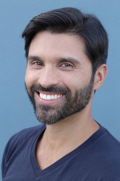 Handsome brunette bearded man close up