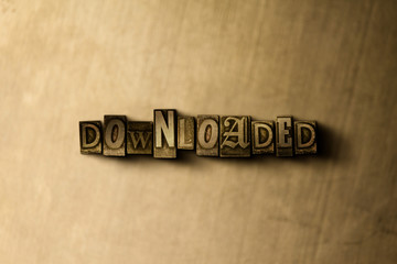 Naklejka premium DOWNLOADED - close-up of grungy vintage typeset word on metal backdrop. Royalty free stock illustration. Can be used for online banner ads and direct mail.