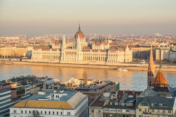 Naklejka premium panoramic views to budapest parliament at sunrise, hungary