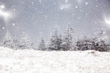 amazing winter sunrise through fog in the mountains