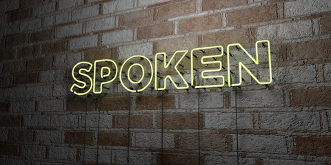 SPOKEN - Glowing Neon Sign on stonework wall - 3D rendered royalty free stock illustration.  Can be used for online banner ads and direct mailers..