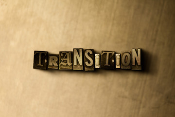 Obraz premium TRANSITION - close-up of grungy vintage typeset word on metal backdrop. Royalty free stock illustration. Can be used for online banner ads and direct mail.