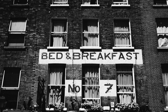 A house with sign on a wall