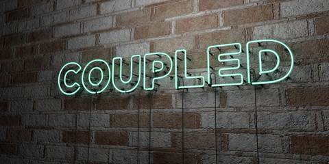 COUPLED - Glowing Neon Sign on stonework wall - 3D rendered royalty free stock illustration.  Can be used for online banner ads and direct mailers..