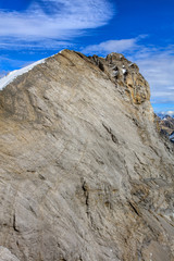 Summit of Mt. Titlis in the Swiss Alps in wintertime. Mount Titlis is a mountain, located on the border between the Swiss cantons of Obwalden and Bern.