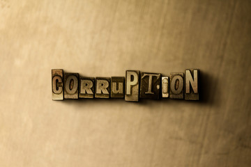 Naklejka premium CORRUPTION - close-up of grungy vintage typeset word on metal backdrop. Royalty free stock illustration. Can be used for online banner ads and direct mail.