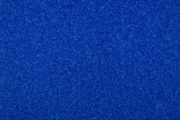 Focused blue abstract glitter background