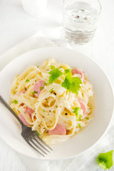 Alfredo tagliatelle pasta with sausages