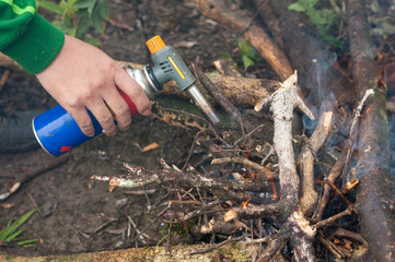 Man burnt twigs with gas pocket