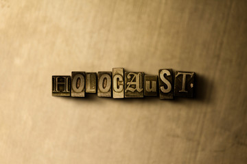 HOLOCAUST - close-up of grungy vintage typeset word on metal backdrop. Royalty free stock illustration.  Can be used for online banner ads and direct mail.