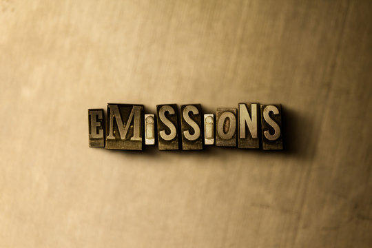 EMISSIONS - close-up of grungy vintage typeset word on metal backdrop. Royalty free stock illustration.  Can be used for online banner ads and direct mail.