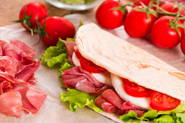Piadina with ham and lettuce. 