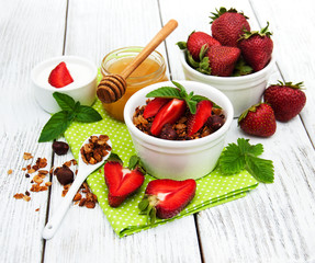 Homemade granola with strawberries