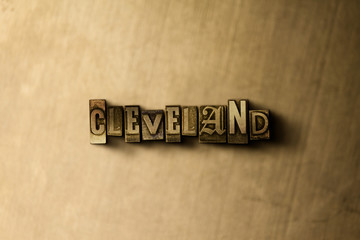 CLEVELAND - close-up of grungy vintage typeset word on metal backdrop. Royalty free stock illustration.  Can be used for online banner ads and direct mail.