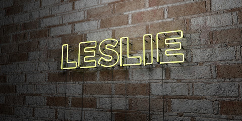 Fototapeta na wymiar LESLIE - Glowing Neon Sign on stonework wall - 3D rendered royalty free stock illustration. Can be used for online banner ads and direct mailers..