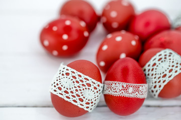 Red Easter eggs on a white background