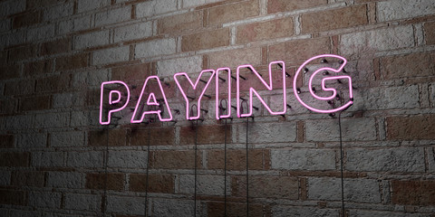 PAYING - Glowing Neon Sign on stonework wall - 3D rendered royalty free stock illustration.  Can be used for online banner ads and direct mailers..