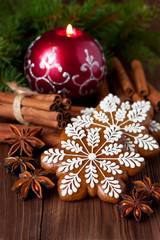 Christmas gingerbread cookies and decoration  on wooden background