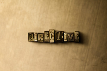 DIRECTIVE - close-up of grungy vintage typeset word on metal backdrop. Royalty free stock illustration.  Can be used for online banner ads and direct mail.