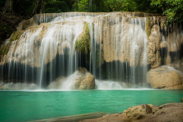 Erawan waterfall, the beautiful waterfall in forest at Erawan National Park - A beautiful waterfall on the River Kwai. Kanchanaburi, Thailand