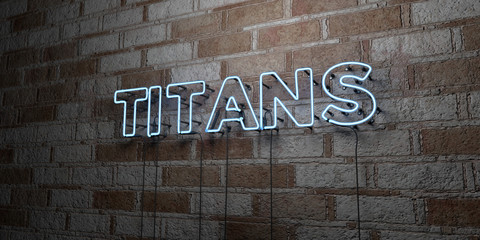 Fototapeta na wymiar TITANS - Glowing Neon Sign on stonework wall - 3D rendered royalty free stock illustration. Can be used for online banner ads and direct mailers..