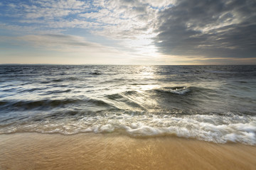 Fototapeta na wymiar sandy beach after sunrise / bright spring landscape