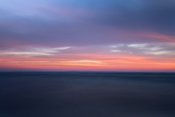sunrise on the water / Early summer morning bright sky Beach