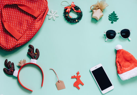 Holiday concept : Flat lay of Christmas ornaments and red woman