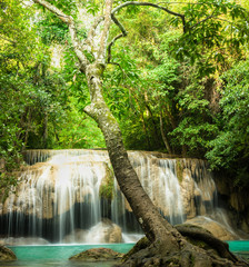 Erawan waterfall, the beautiful waterfall in forest at Erawan National Park - A beautiful waterfall on the River Kwai. Kanchanaburi, Thailand