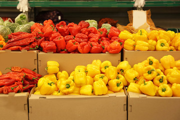 Boxes with fresh vegetables in supermarket
