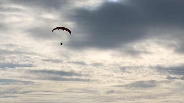 Paramotor flying in the sky