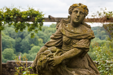 Fototapeta na wymiar Figure in the park of Rothenburg ob der Tauber, Germany