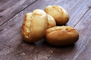 Homemade bread loaf on rustic dark background