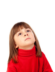 Happy small girl looking up