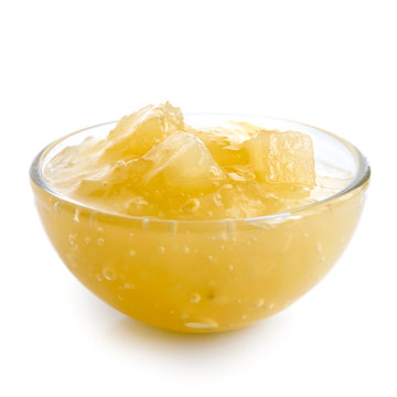 Bramley Apple Sauce In Glass Bowl Isolated On White.