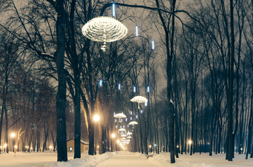 Light umbrella decoration in park at winter night, Kharkov, Ukraine