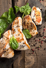 Grilled turkey fillet with appetizing roasted crust garnish spin