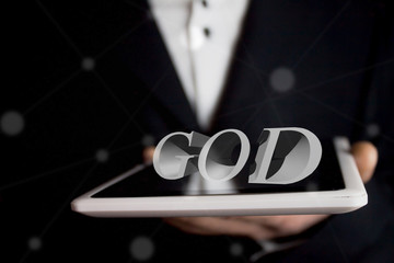 tablet and word god on businessman hand