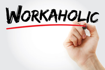 Hand writing Workaholic with marker, concept background