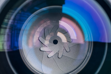 Close up shot of Camera Lens on the black background.
lens diaphragm macro with reflection



