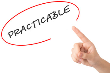 Hand of a young girl points to a word