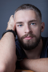 Obraz premium Portrait of a young man with a beard