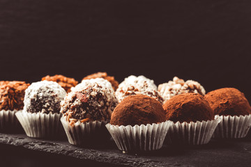 Set of different kinds of homemade chocolate truffles. Selective