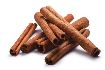 Pile of cinnamon sticks, paths - obrazy, fototapety, plakaty
