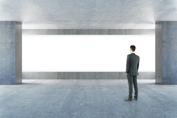 Businessman looking at billboard
