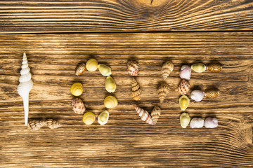 on a wooden board laid out the word love