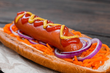 Grilled hot dogs with mustard, ketchup