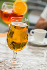 Traditional Spritz aperitif and beer  in a bar in Italy