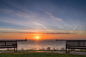 Fototapeta na wymiar Tynemouth Sunrise, at the mouth of the River Tyne which is located between South Shields and Tynemouth, where it enters the North Sea
