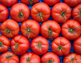 Tomatoes in box as a background.